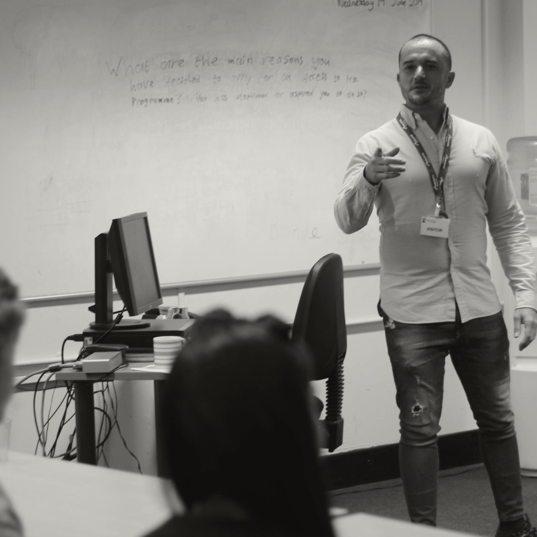 Austin Sharp Teaching in a classroom