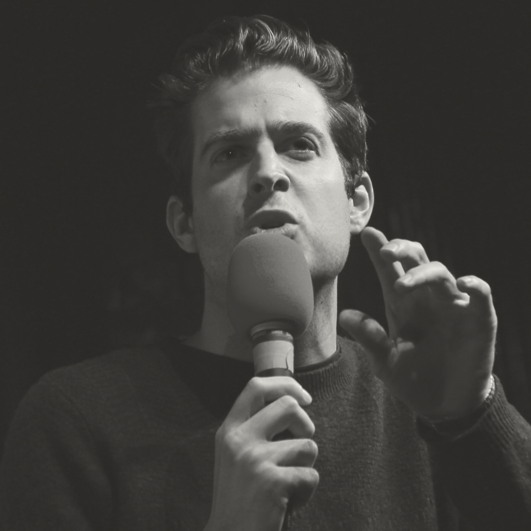Dave Green speaking into microphone