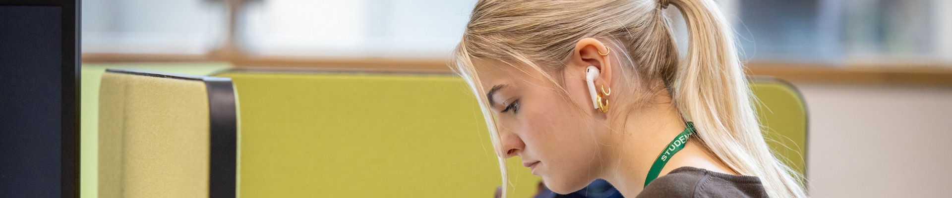 female student on her laptop