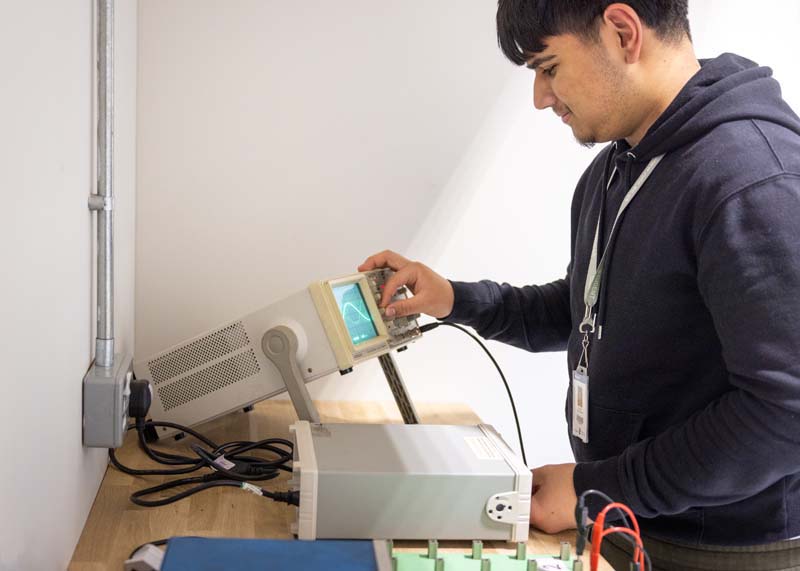 Electrical installation male student testing
