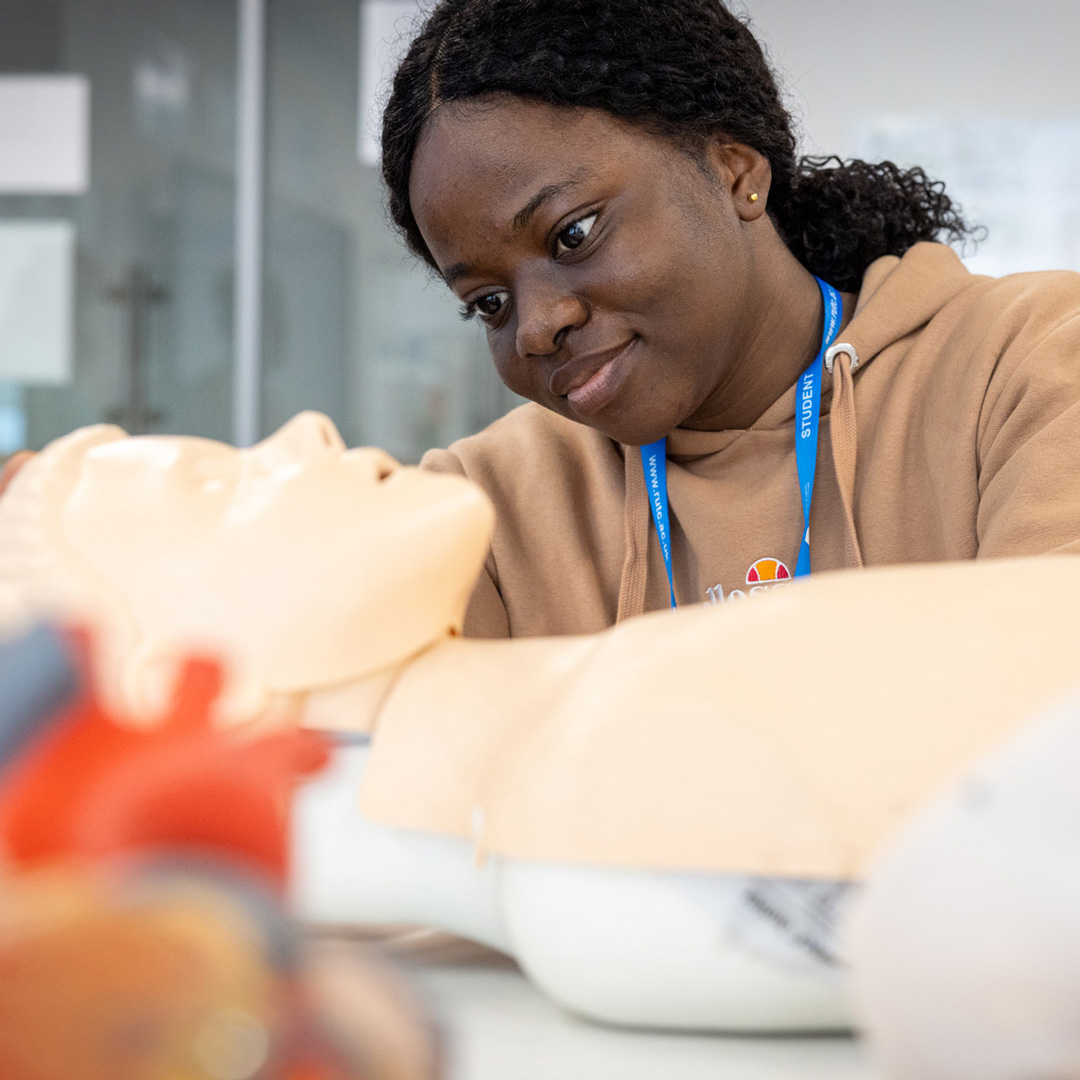 student using an Annie CPR doll