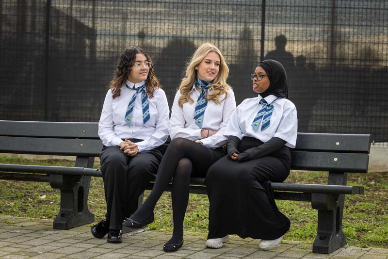Travel tourism students on bench