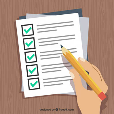 Hand holding pen and filling out form 